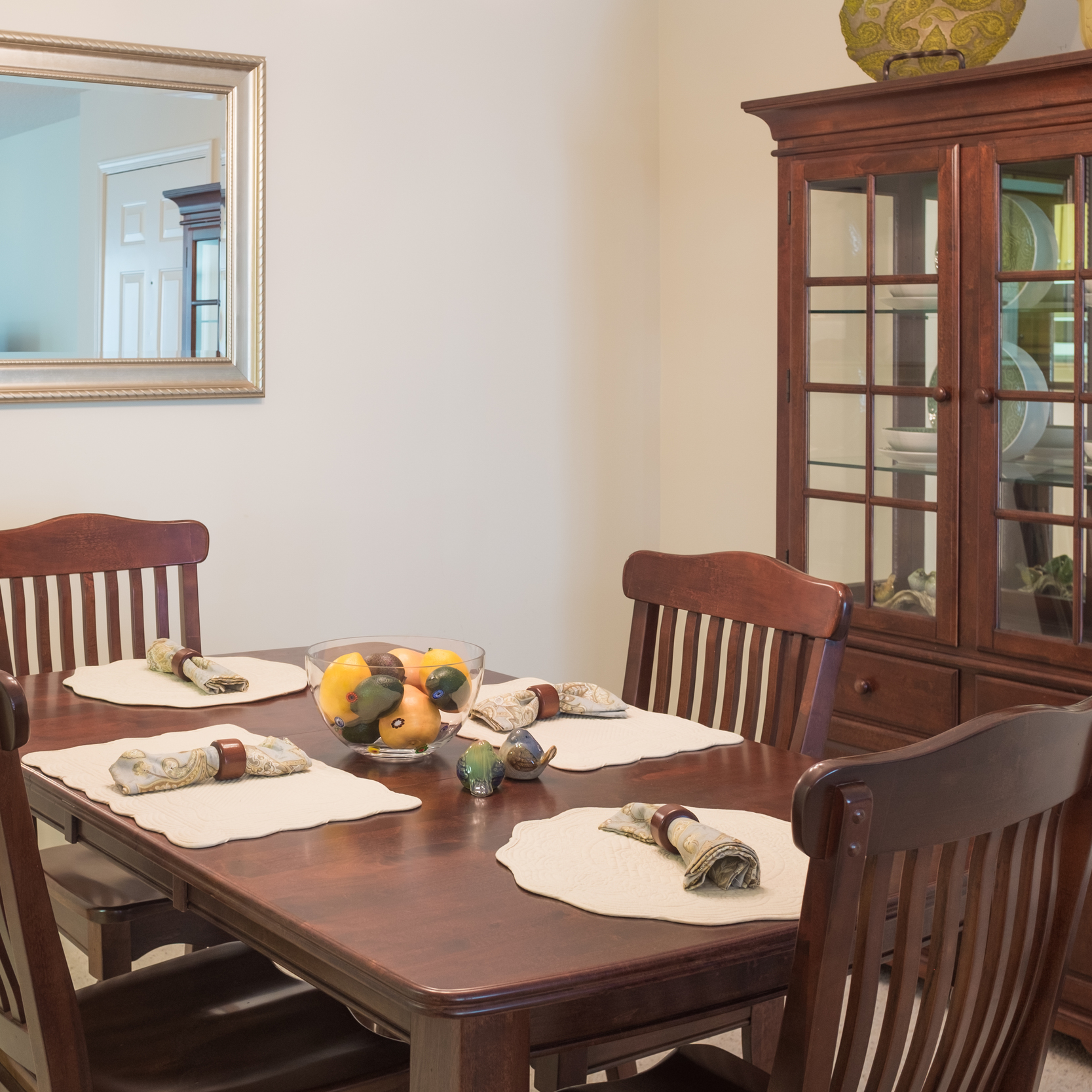 Well-decorated dining area with table and chairs