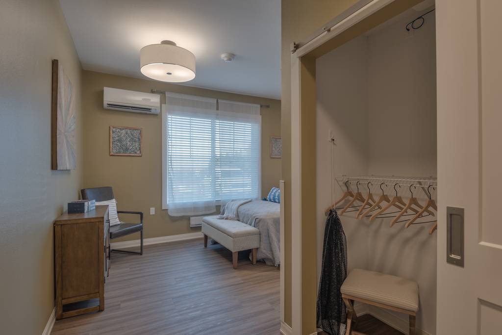 Interior of a private resident room with light decor