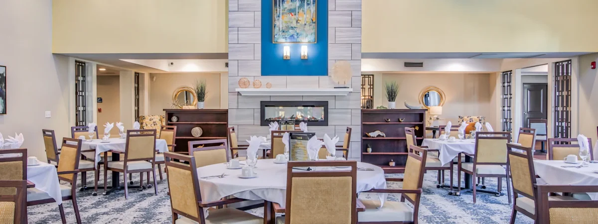 Dining room with elegantly set tables and decor