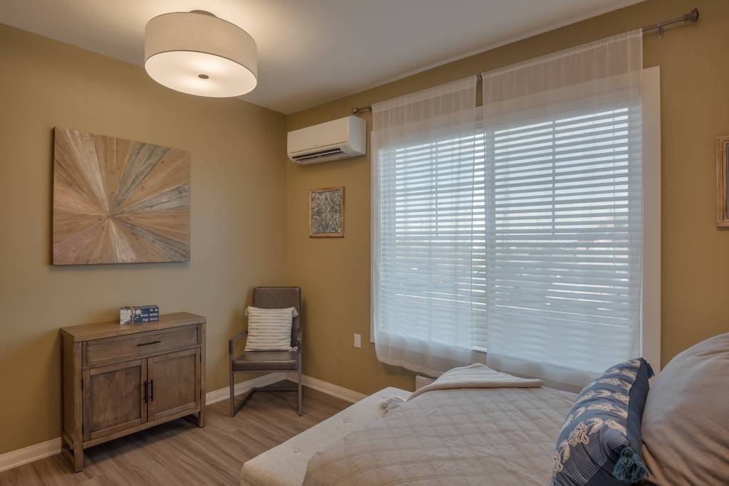 Cozy resident room with natural light and modern decor