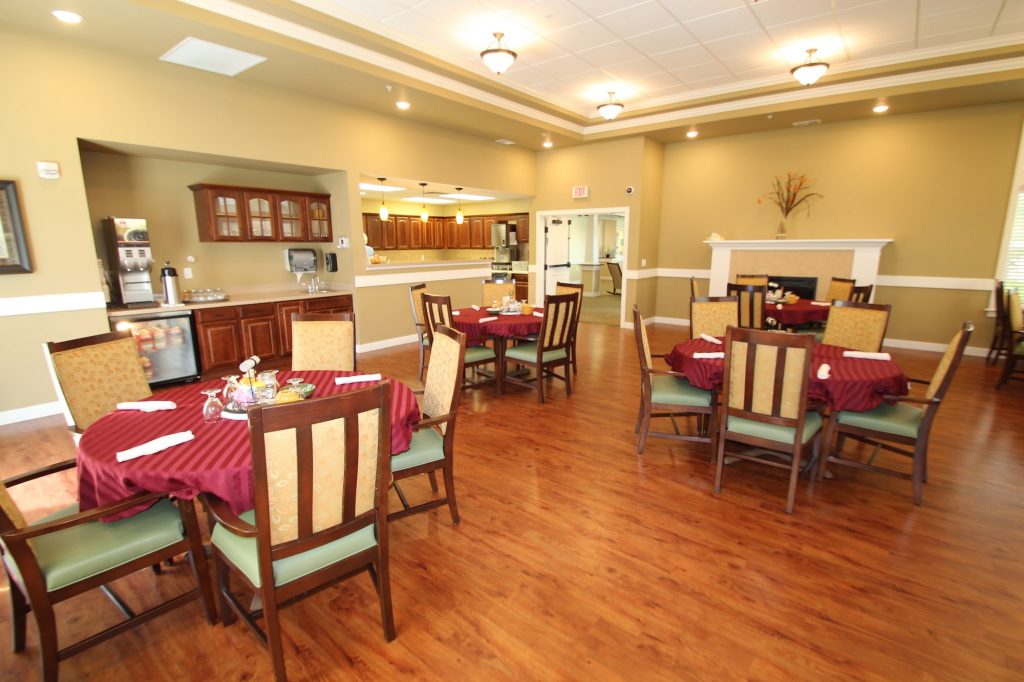 Bright dining area with tables set for meals