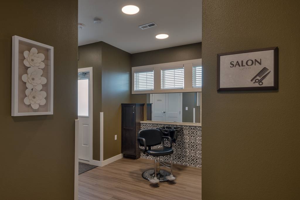 Interior view of a salon with styling chair