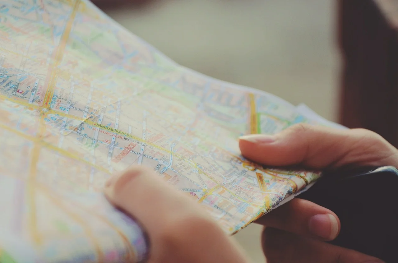 Person holding a detailed map