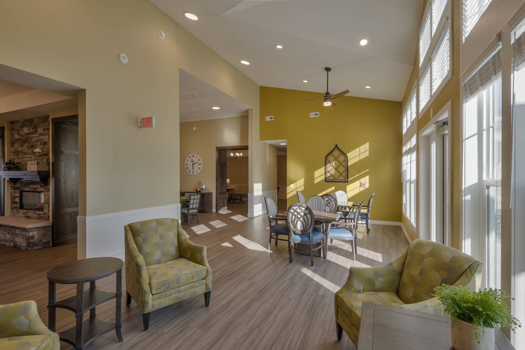 Bright common area with seating and tables