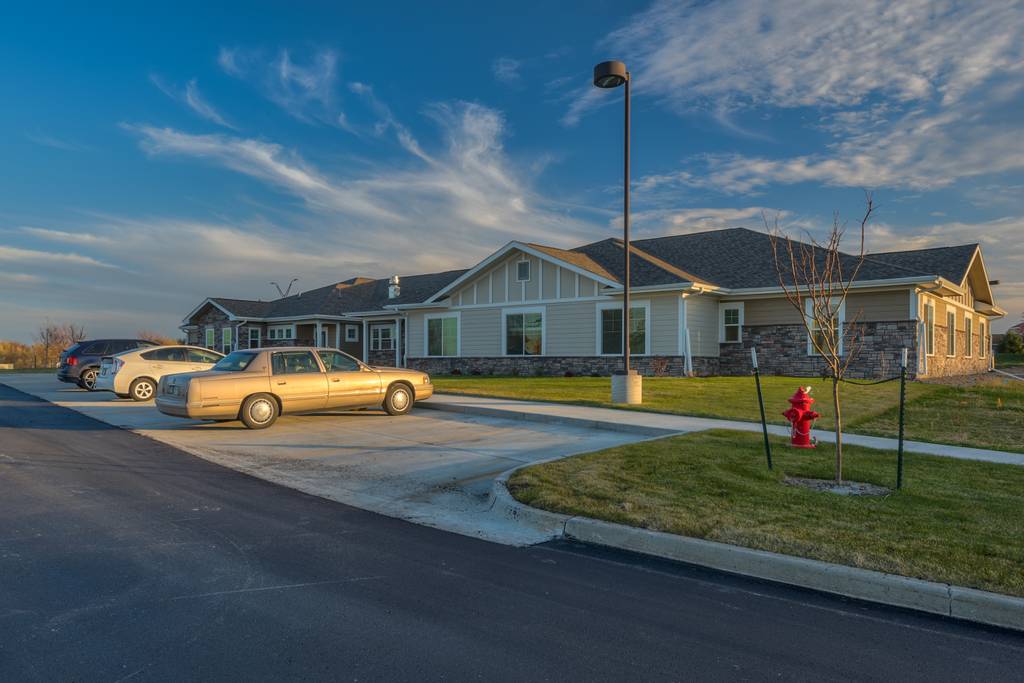 Exterior view of Northridge Village with parked vehicles