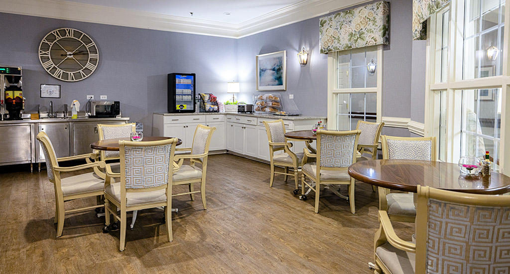 Cozy dining area with tables and chairs