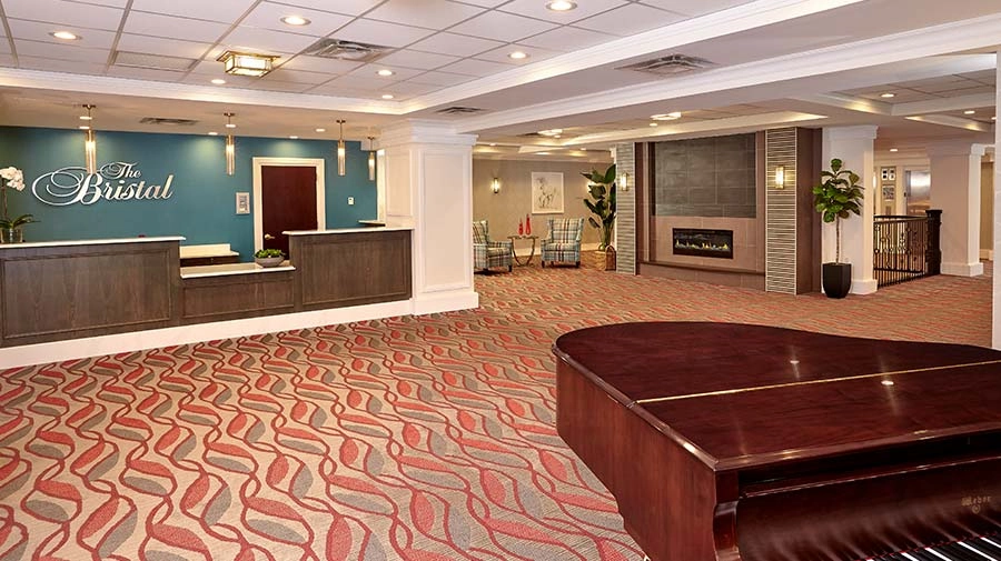 Lobby area with reception desk and seating