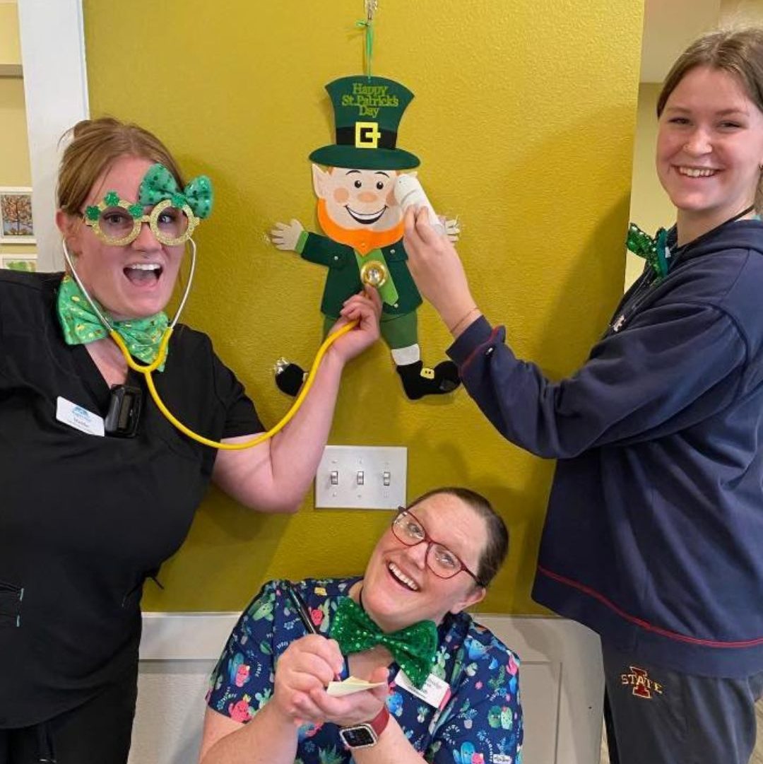Staff members celebrating St. Patrick's Day