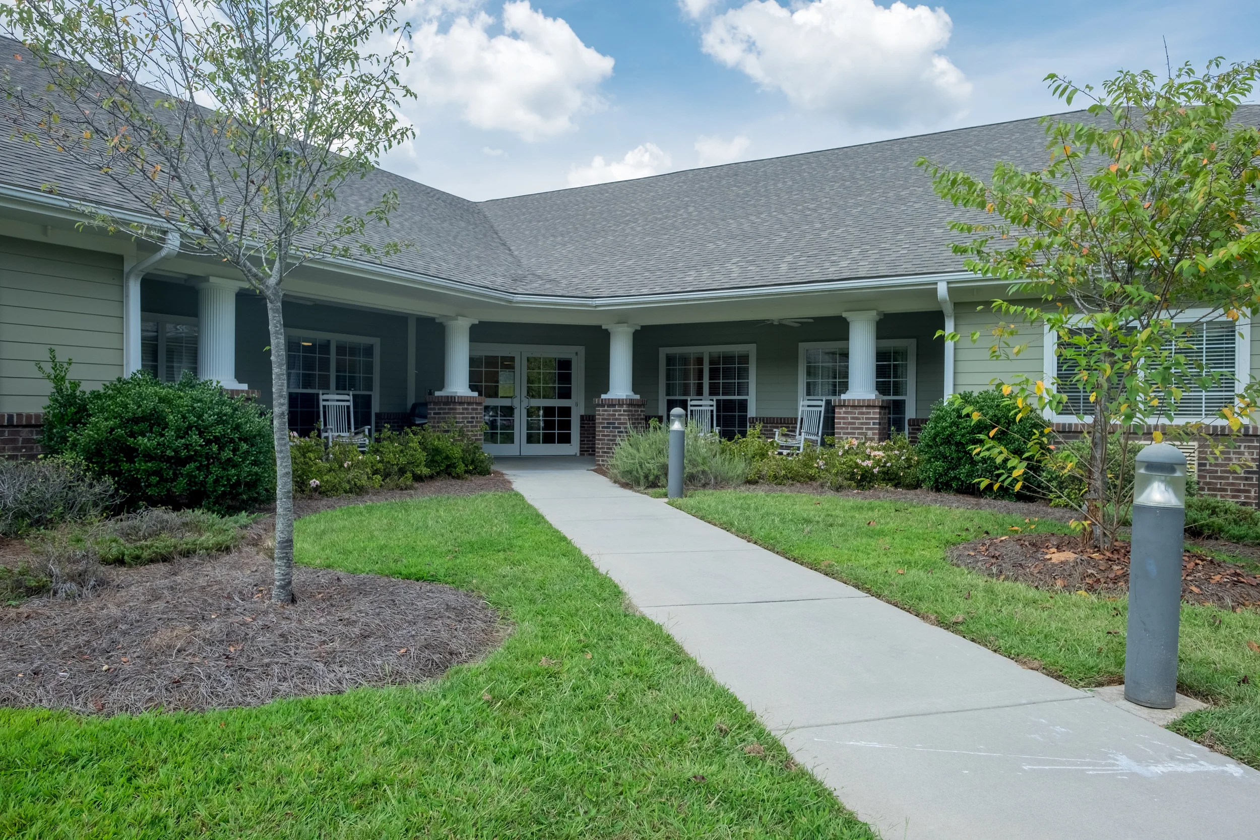 Pathway leading to the entrance of a senior living facility