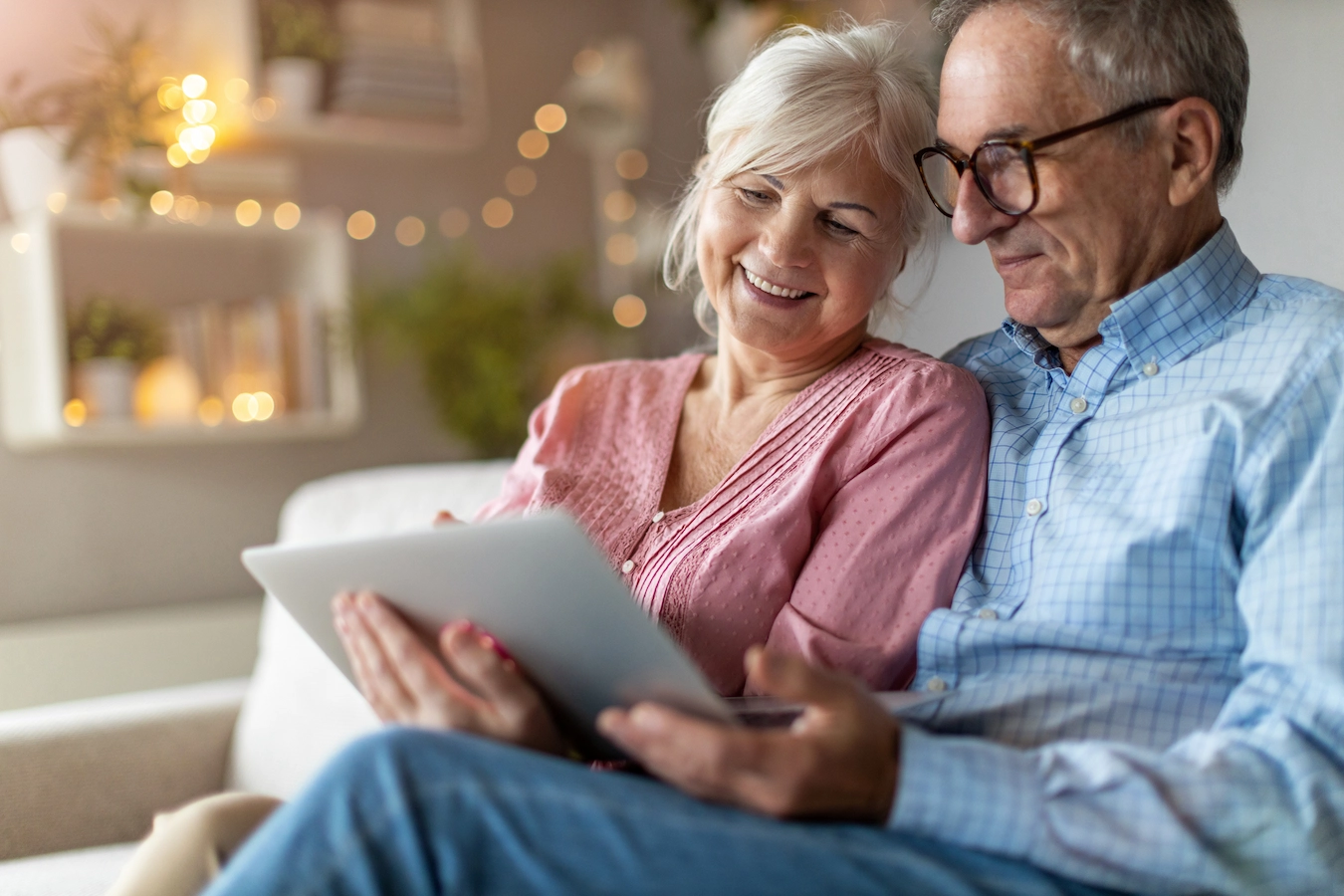 Couple enjoying time together with a tablet