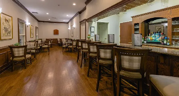 Interior common area with bar seating and decor