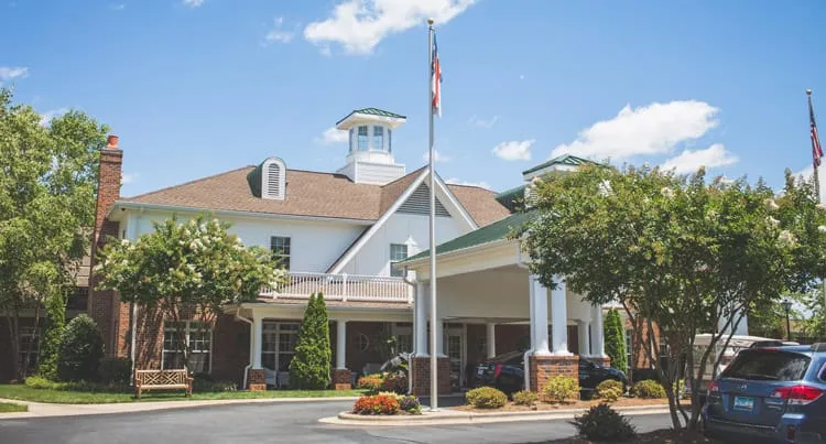 Exterior view of Homestead Hills facility with gardens