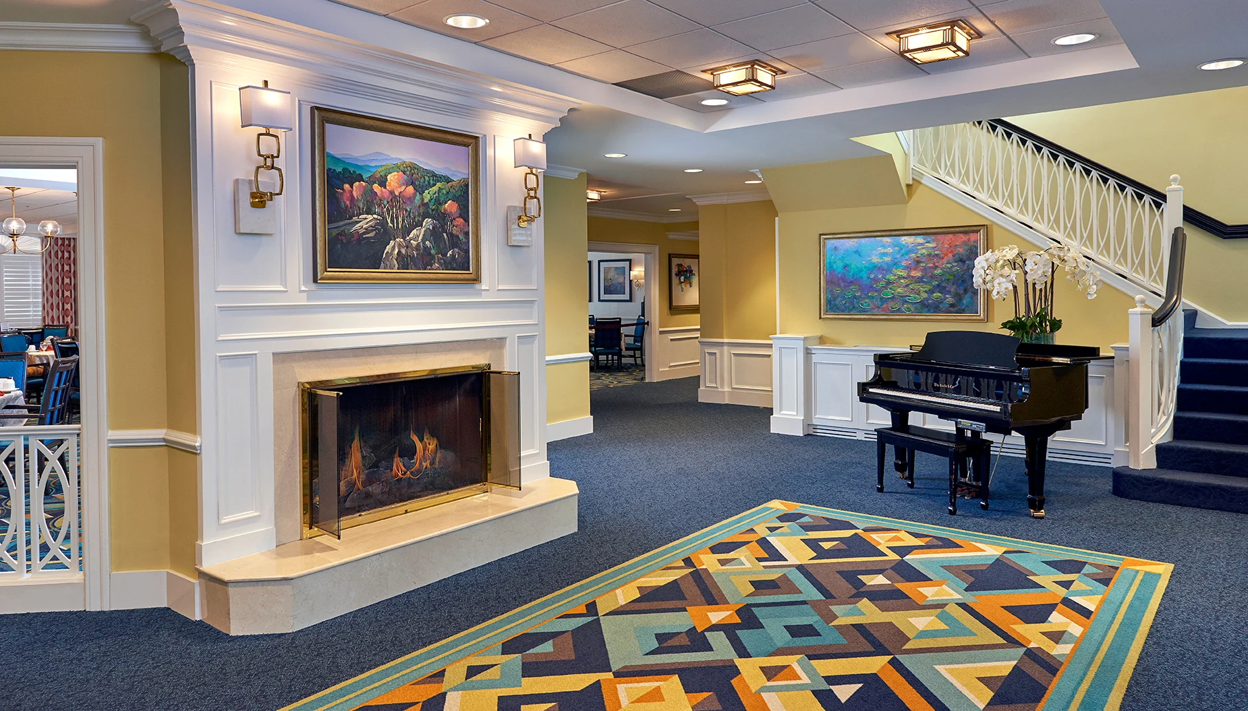 Interior common area with fireplace and piano