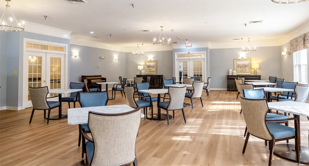 Bright dining room with tables and chairs