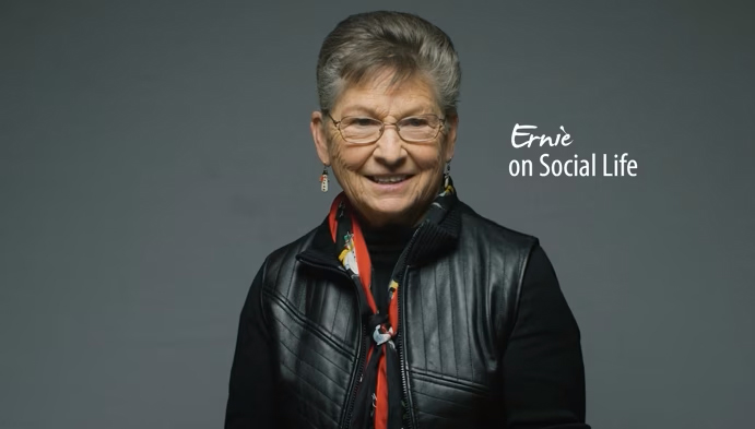 Senior resident smiling in a casual portrait