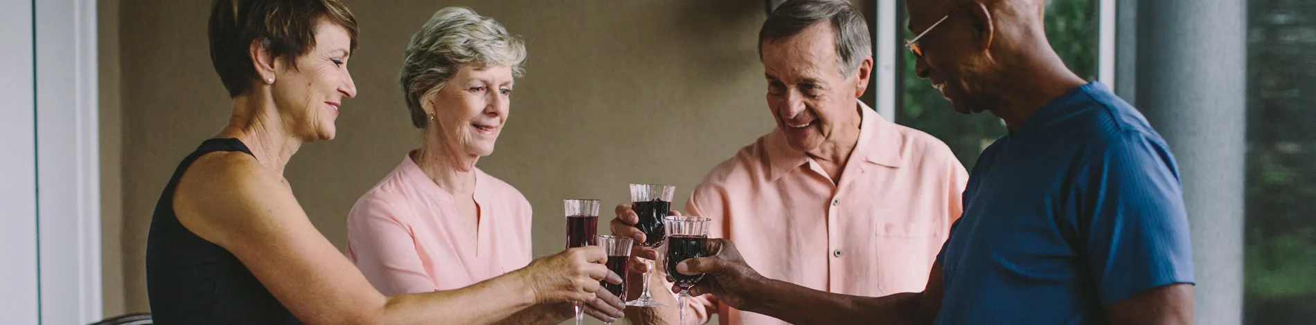 Residents raising glasses in a celebratory toast