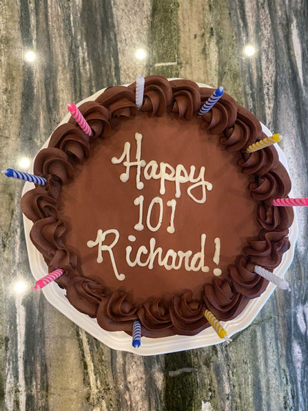 A chocolate cake for a 101st birthday celebration.