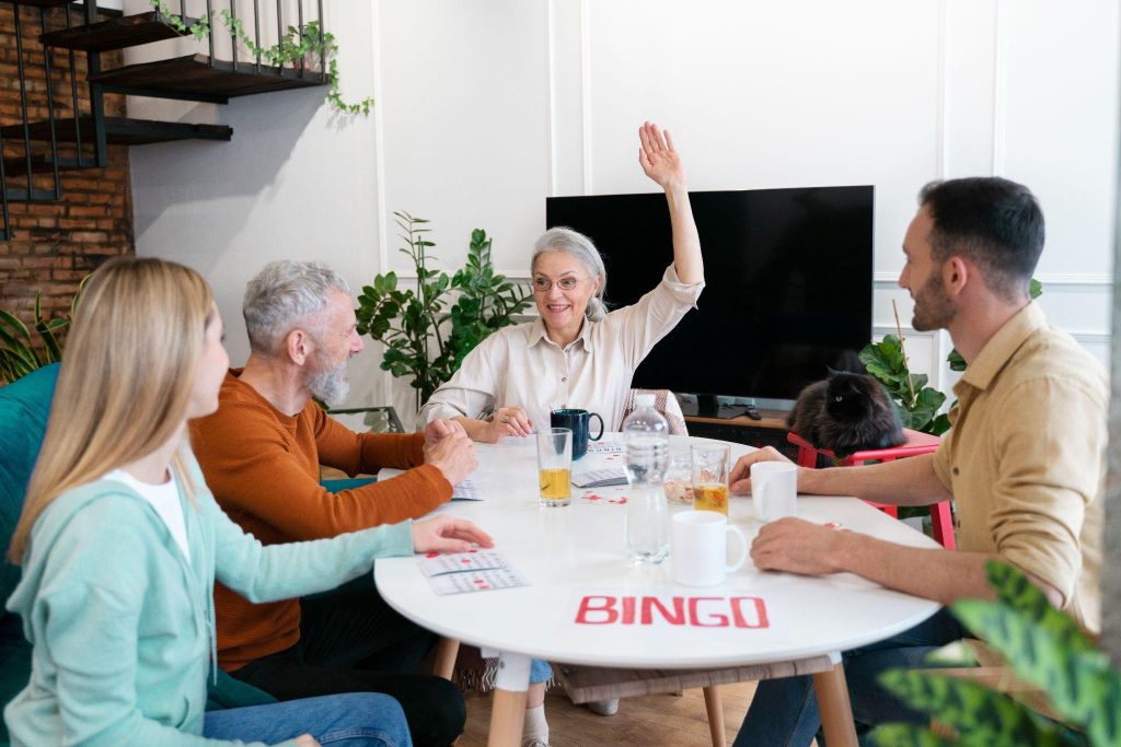 Residents enjoying a game of bingo indoors.