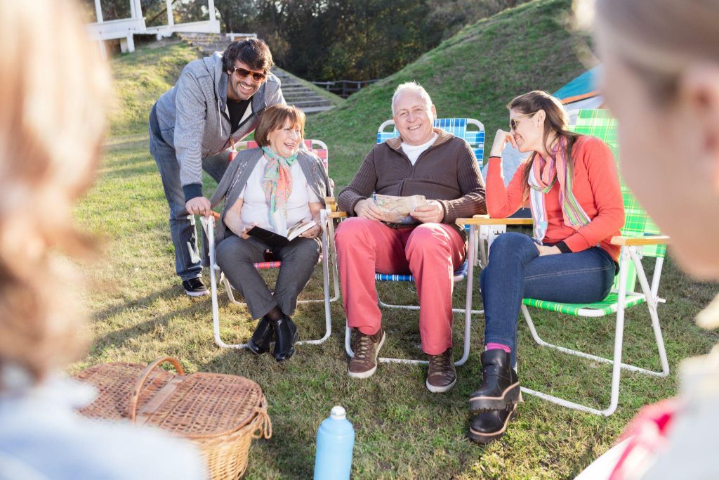 Seniors enjoying a picnic in the park