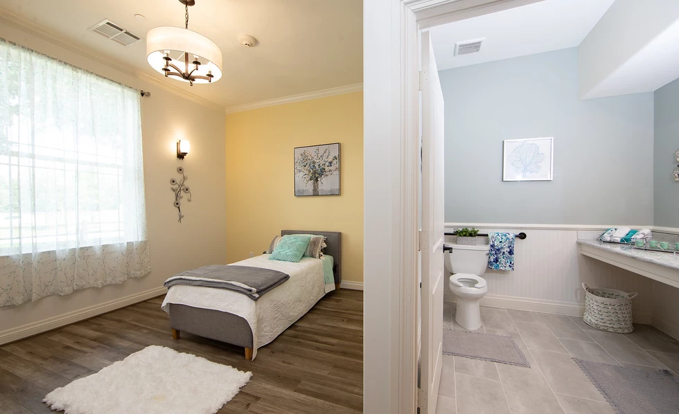 Clean bedroom and bathroom layout