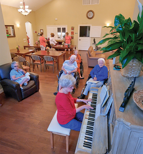 Residents enjoying music in a common area.