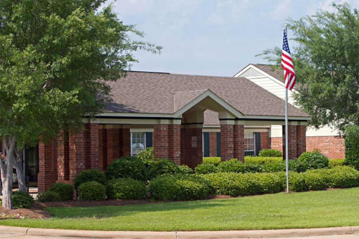 Exterior view of Azalea Estates of Monroe with landscaping