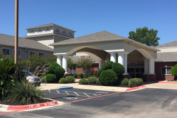 Exterior view of Azalea Estates building entrance