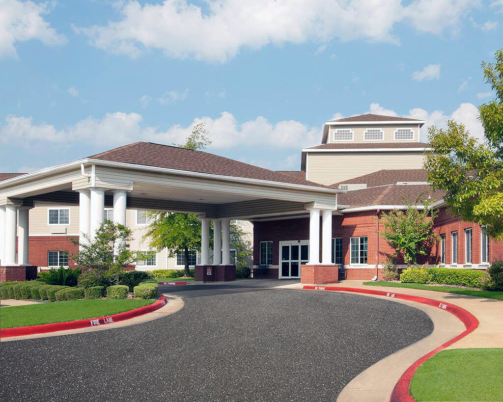 Exterior view of Azalea Estates of Gonzales building