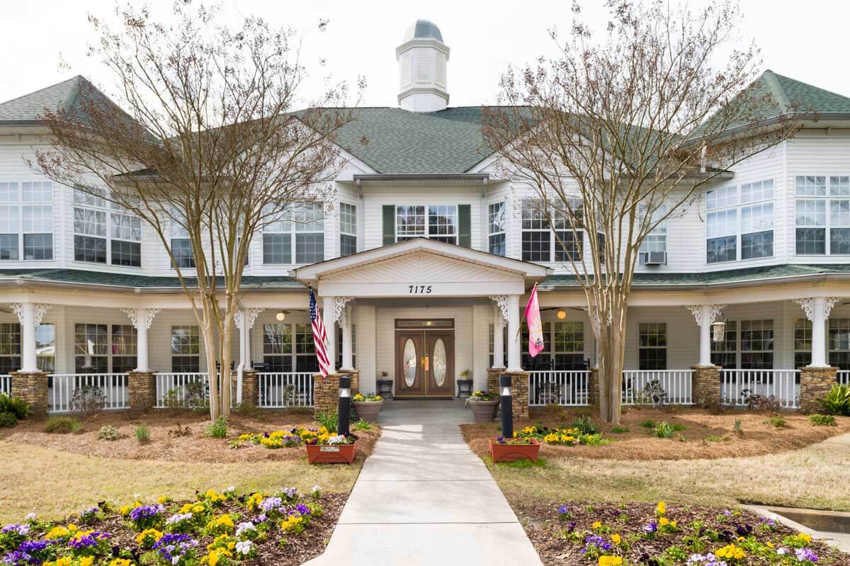 Front entrance of Azalea Estates with landscaped garden