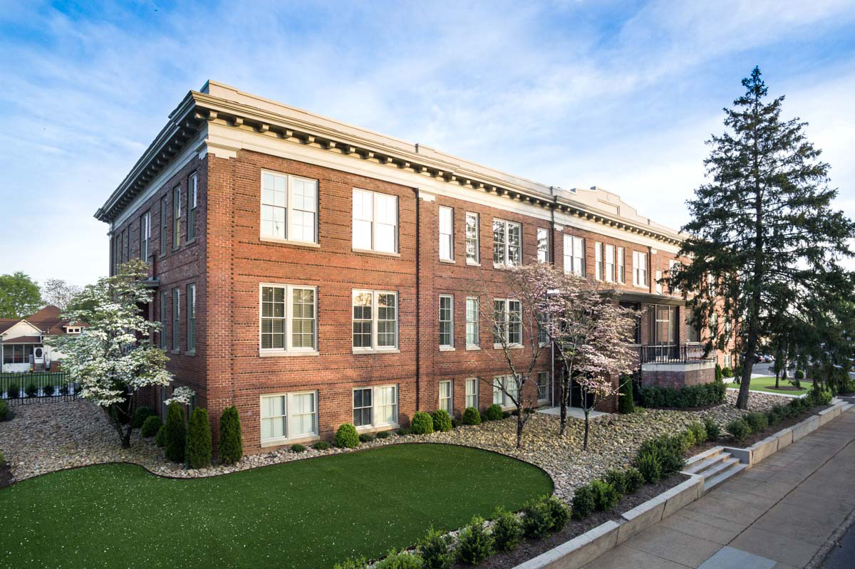 Exterior view of Azalea Estates of Monroe with gardens
