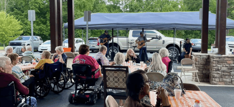 Residents enjoying a live music performance outdoors