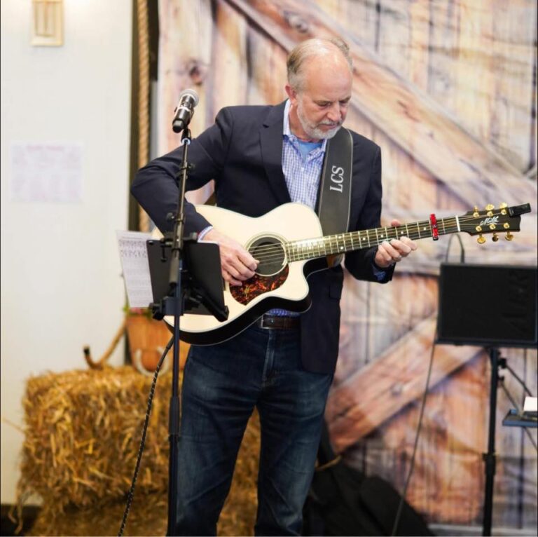 Musician performing at a community event