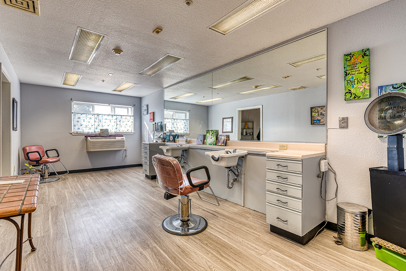 Interior view of a hair salon space in the facility