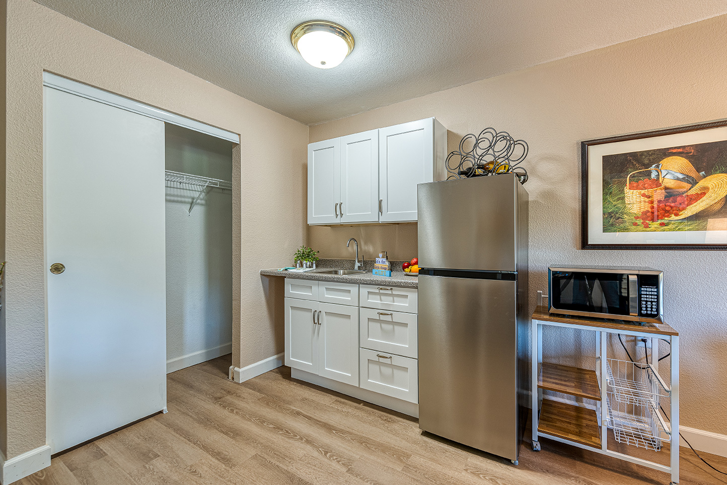 A kitchenette area in a resident room