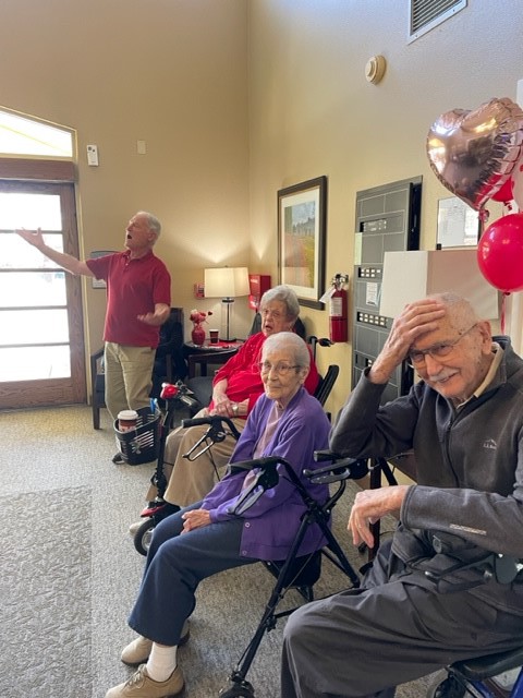 Residents enjoying a gathering in the common area