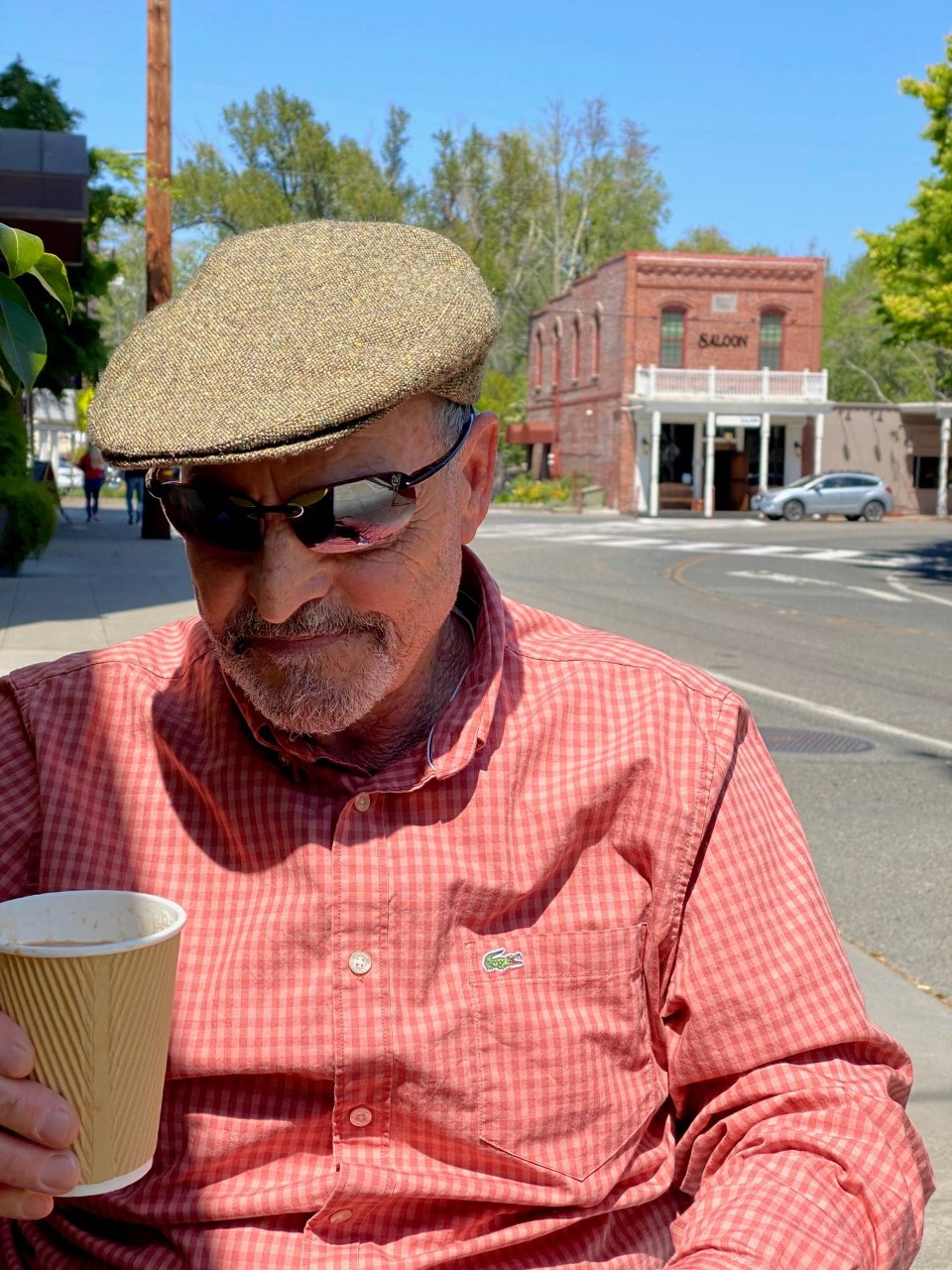 Senior man enjoying coffee outdoors