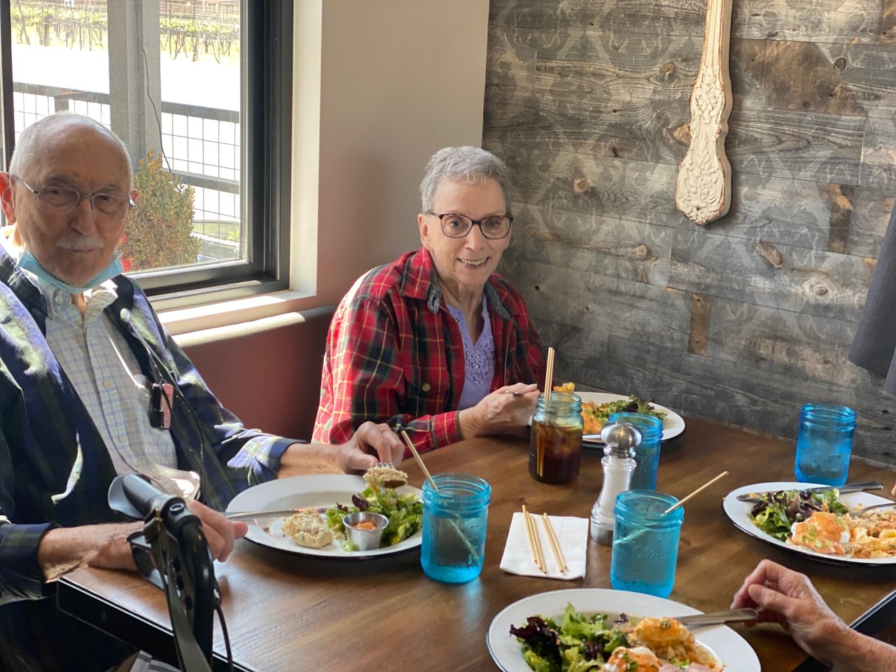 Residents enjoying lunch together in a dining area