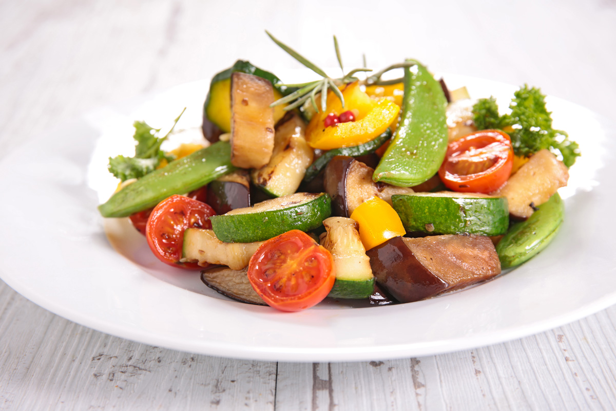A plate of colorful roasted vegetables