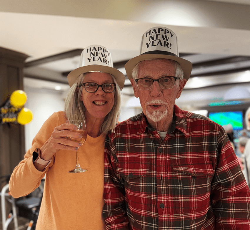 Residents celebrating New Year's in a common area