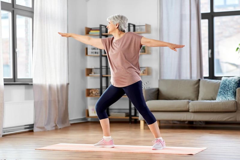 Woman participating in a fitness activity indoors