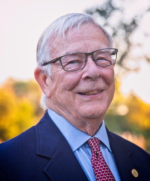 Smiling senior man in outdoor setting