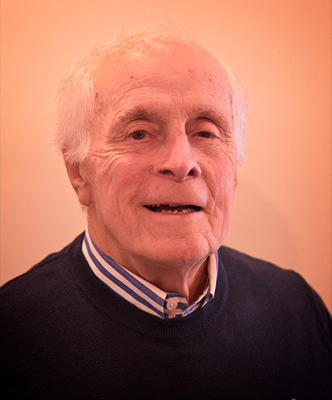 Portrait of an elderly man smiling at the camera