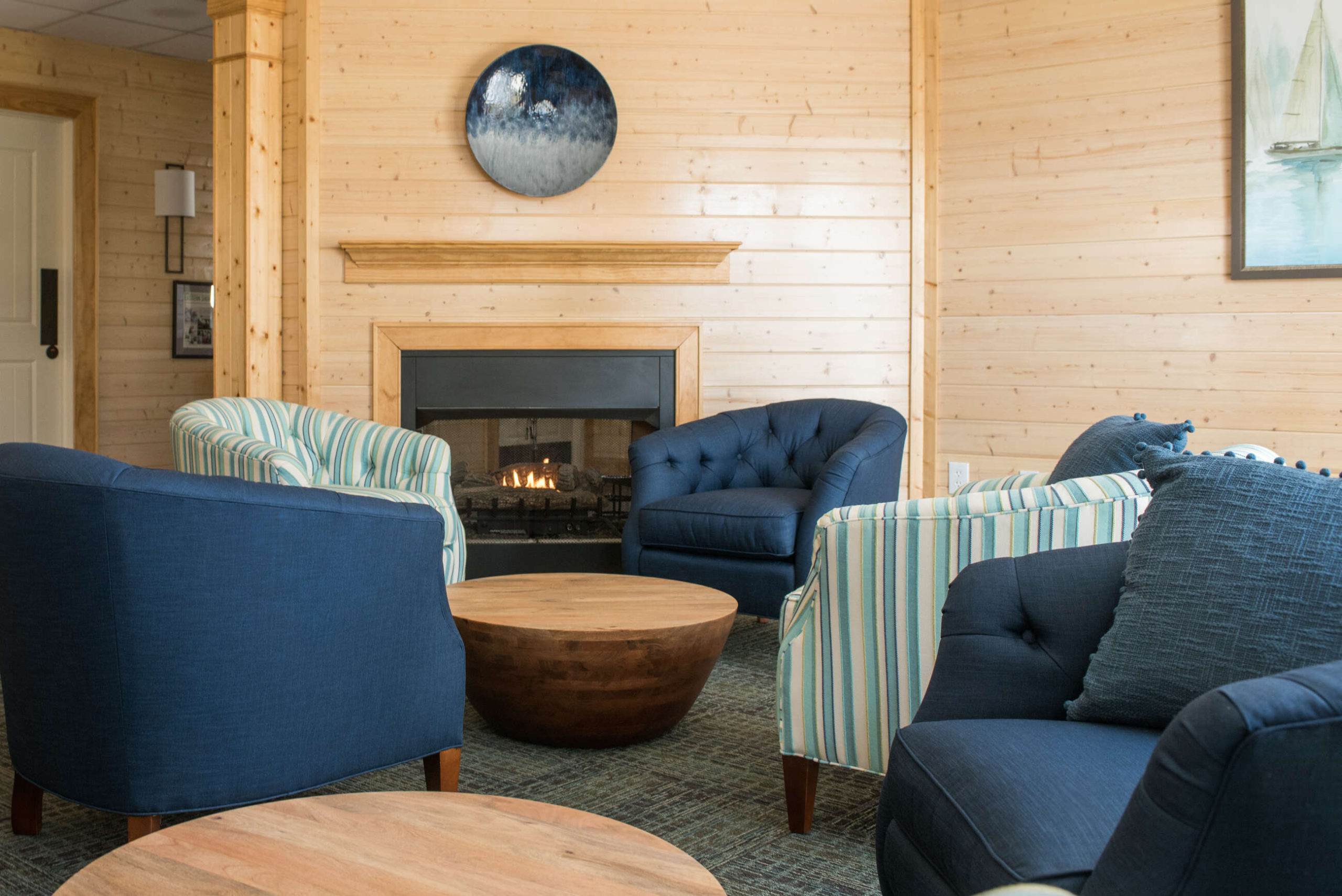 Cozy common area with seating and fireplace