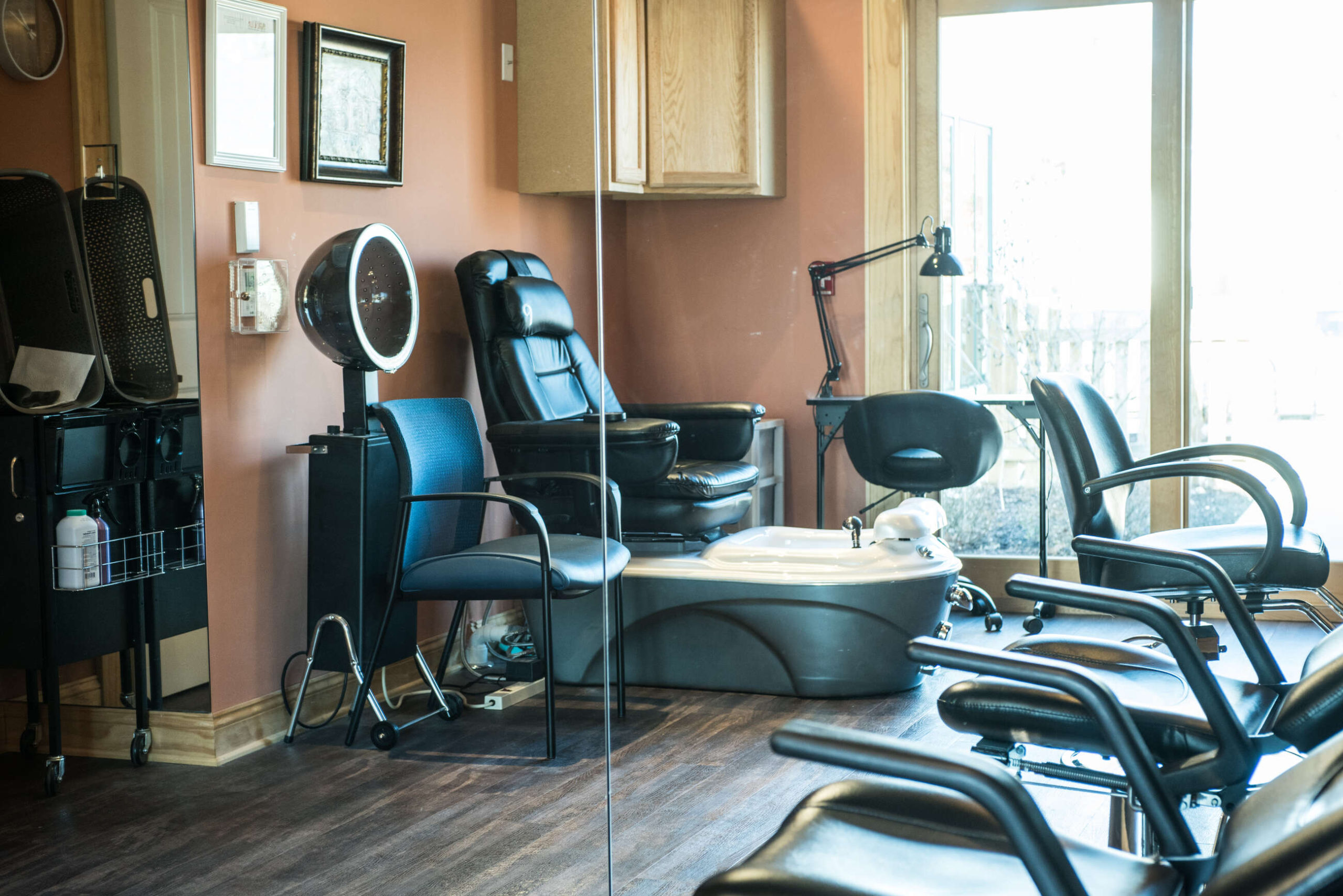 Interior view of a hair salon area with chairs