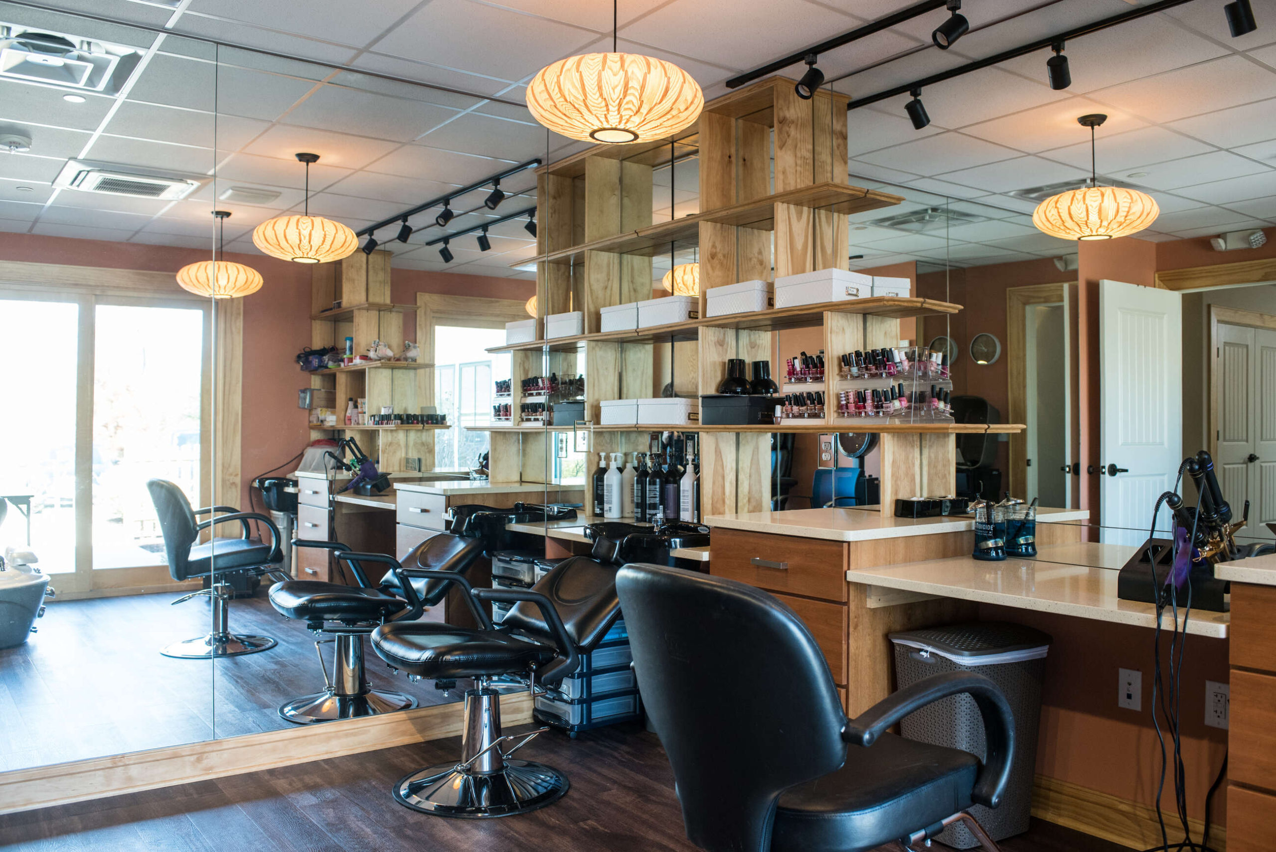 Interior view of a salon area with styling stations