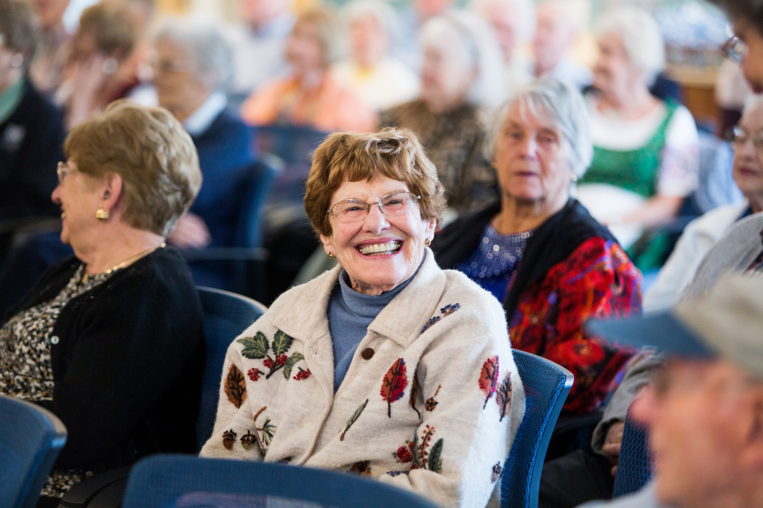 Residents enjoying an event in a common area