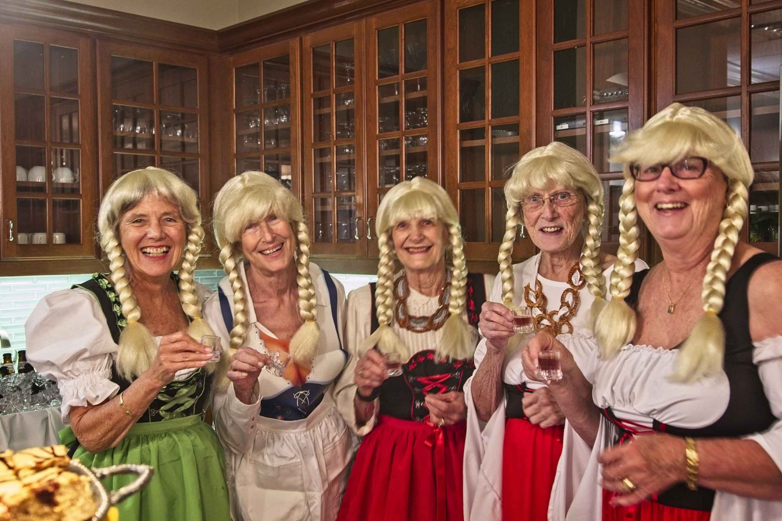 Residents celebrating in a festive kitchen setting