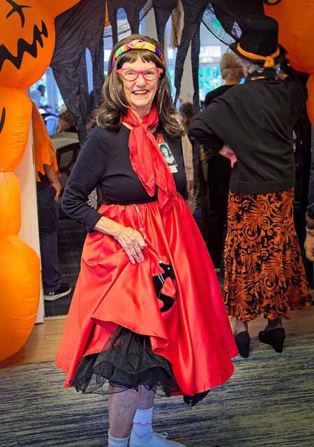 Resident dressed in costume during a festive celebration