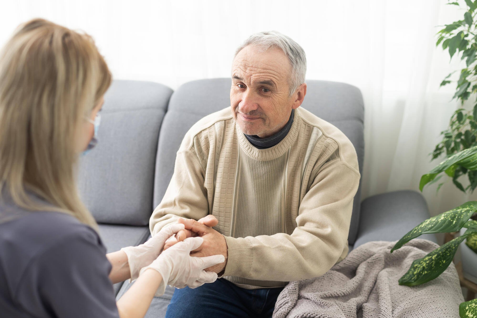 Caregiver interacting with a senior resident