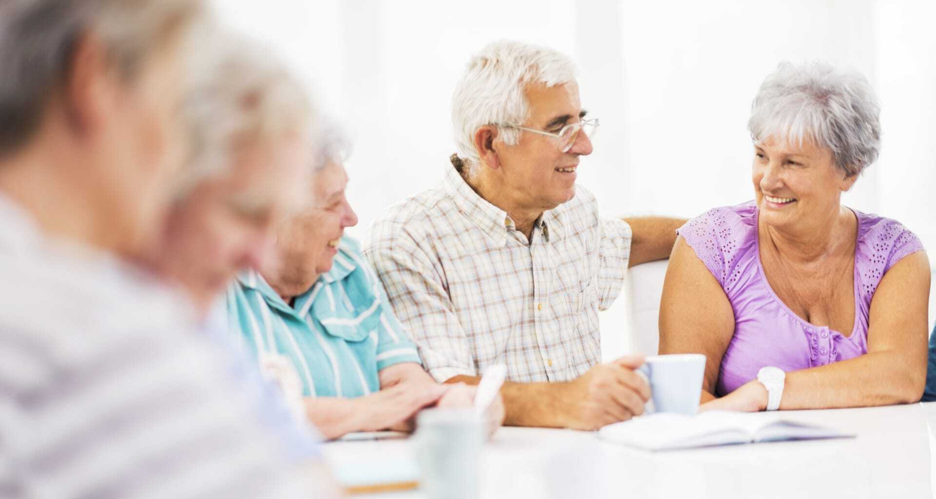 Residents engaging in conversation during an activity